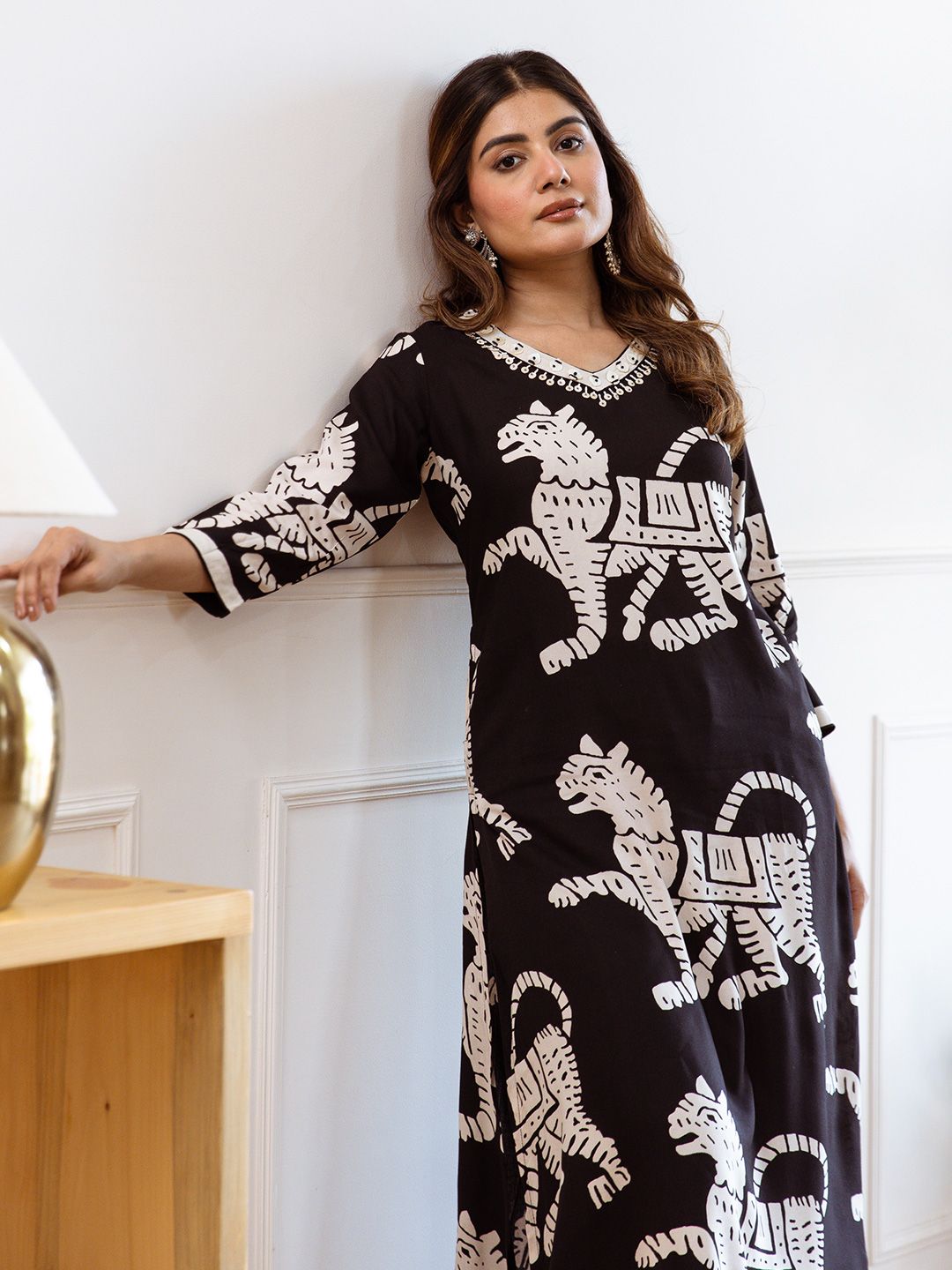 Comfy Black Viscose Rayon Animal Printed Kurta Set with  Afghani Bottom