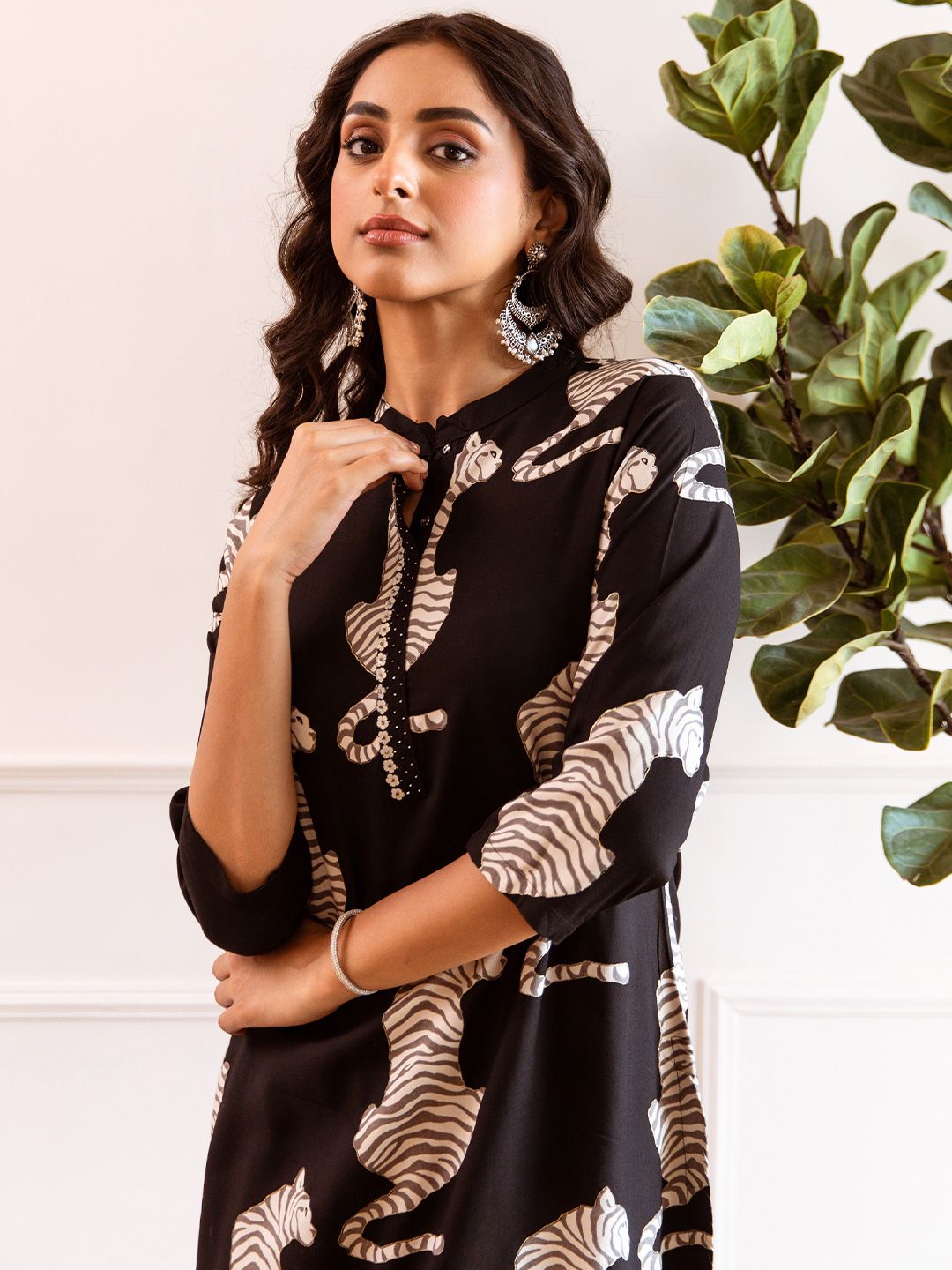 Comfy Black Viscose Rayon Animal Printed Kurta with Mandarin Collar and Palazzos