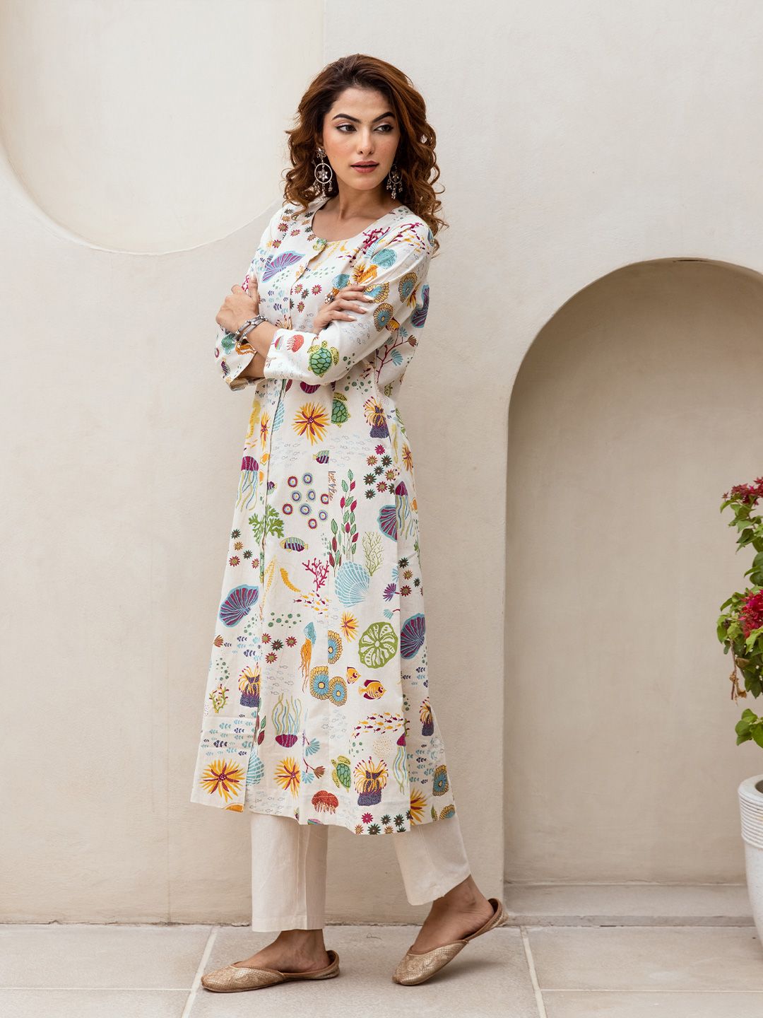 Comfy Off-White Pure Cotton Floral Printed Kurta Set with Gotta Patti Detailing and Straight Bottom