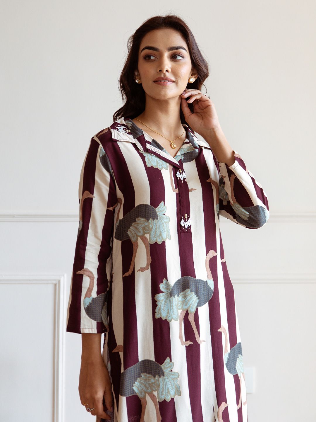 Comfy Maroon Viscose Rayon Printed Kurta Set with Embellished Collar and Straight Bottom