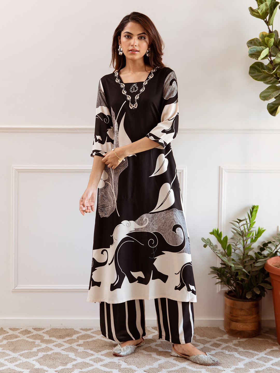 Comfy Black  Rayon Bold Printed A-Line Kurta Set With Palazzo Bottom