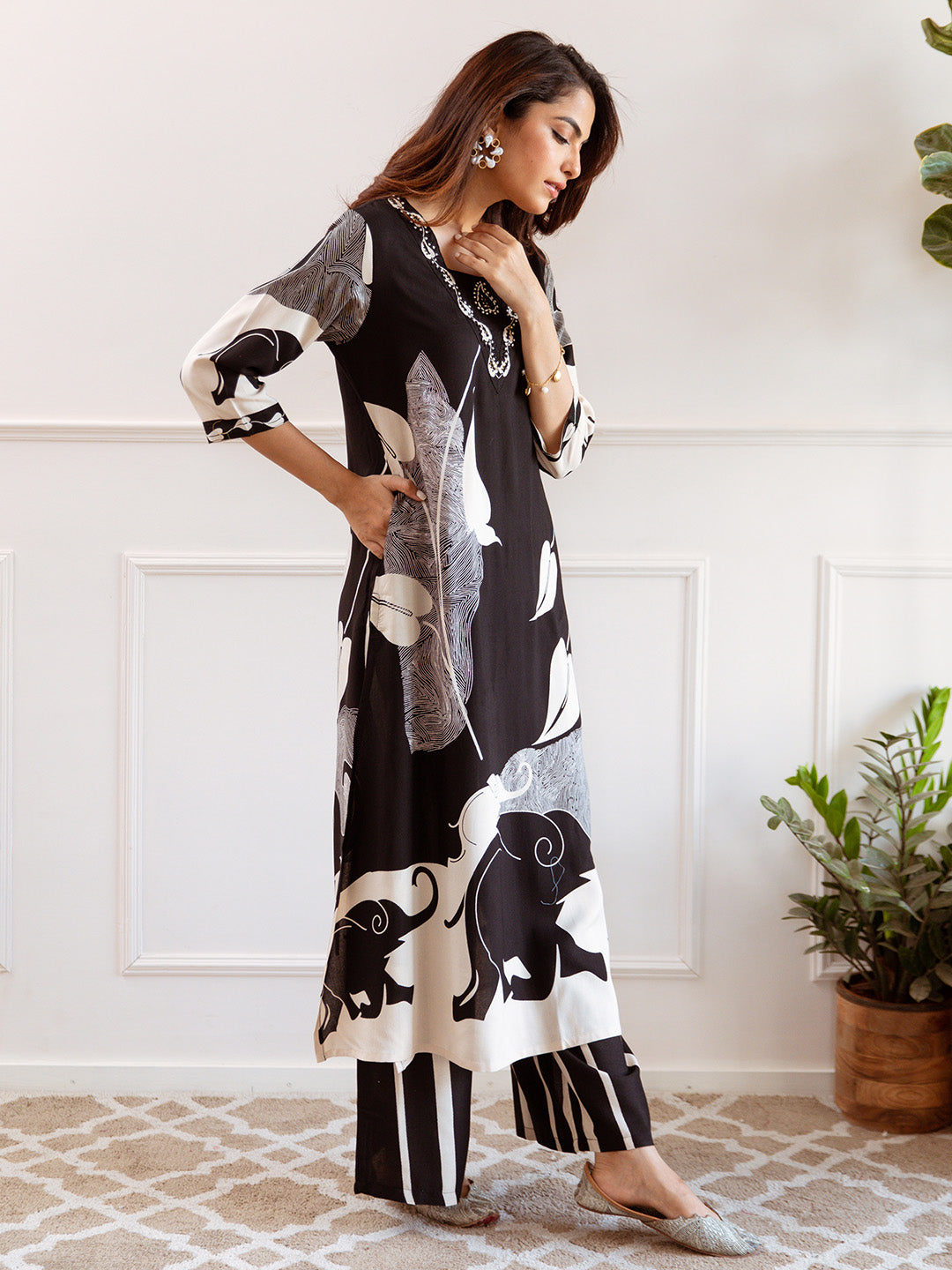 Comfy Black  Rayon Bold Printed A-Line Kurta Set With Palazzo Bottom