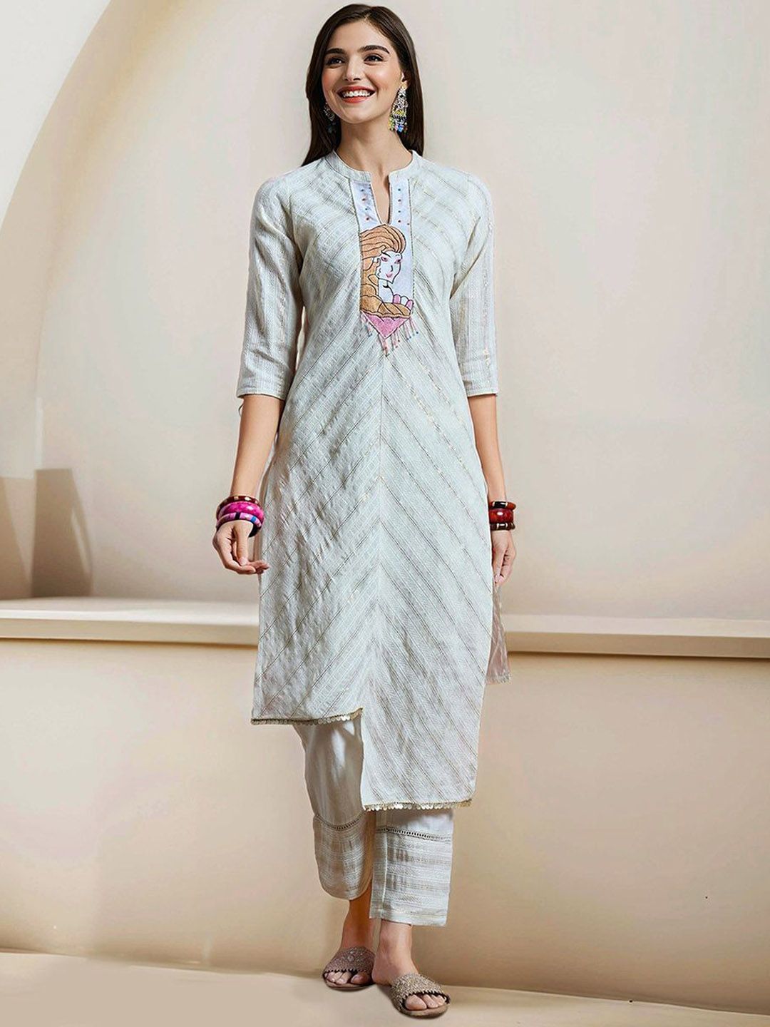 Comfy Off-White Pure Cotton Floral Printed Kurta Set with Gotta Patti Detailing and Straight Bottom