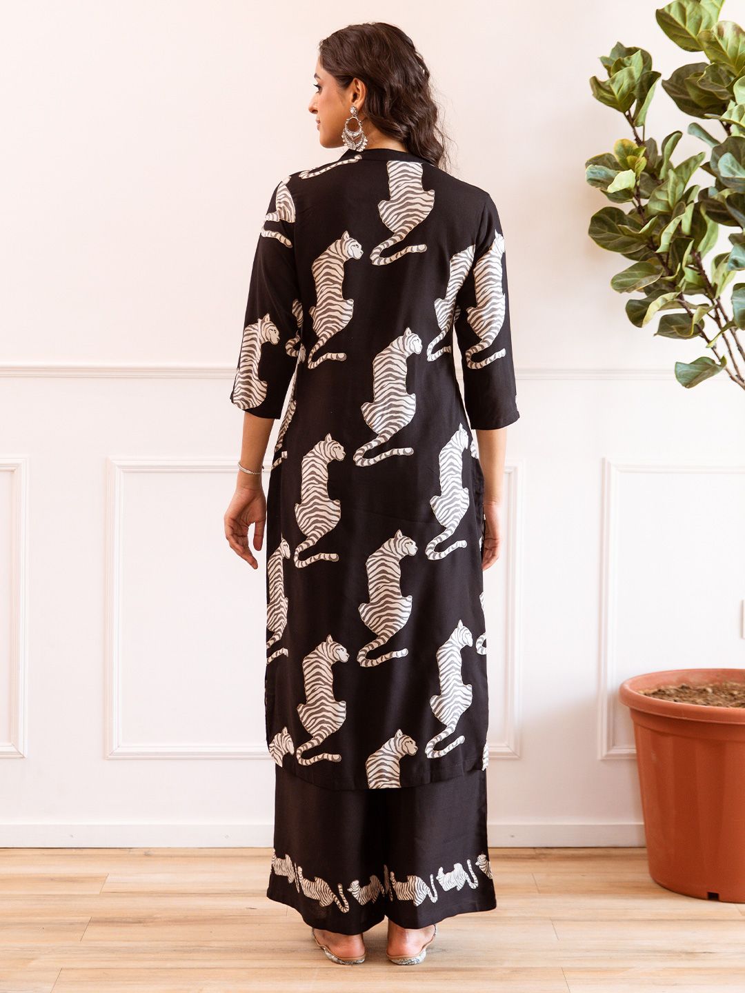 Comfy Black Viscose Rayon Animal Printed Kurta with Mandarin Collar and Palazzos