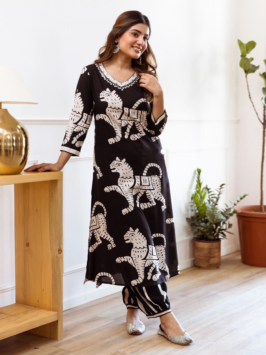 Comfy Black Viscose Rayon Animal Printed Kurta Set with  Afghani Bottom