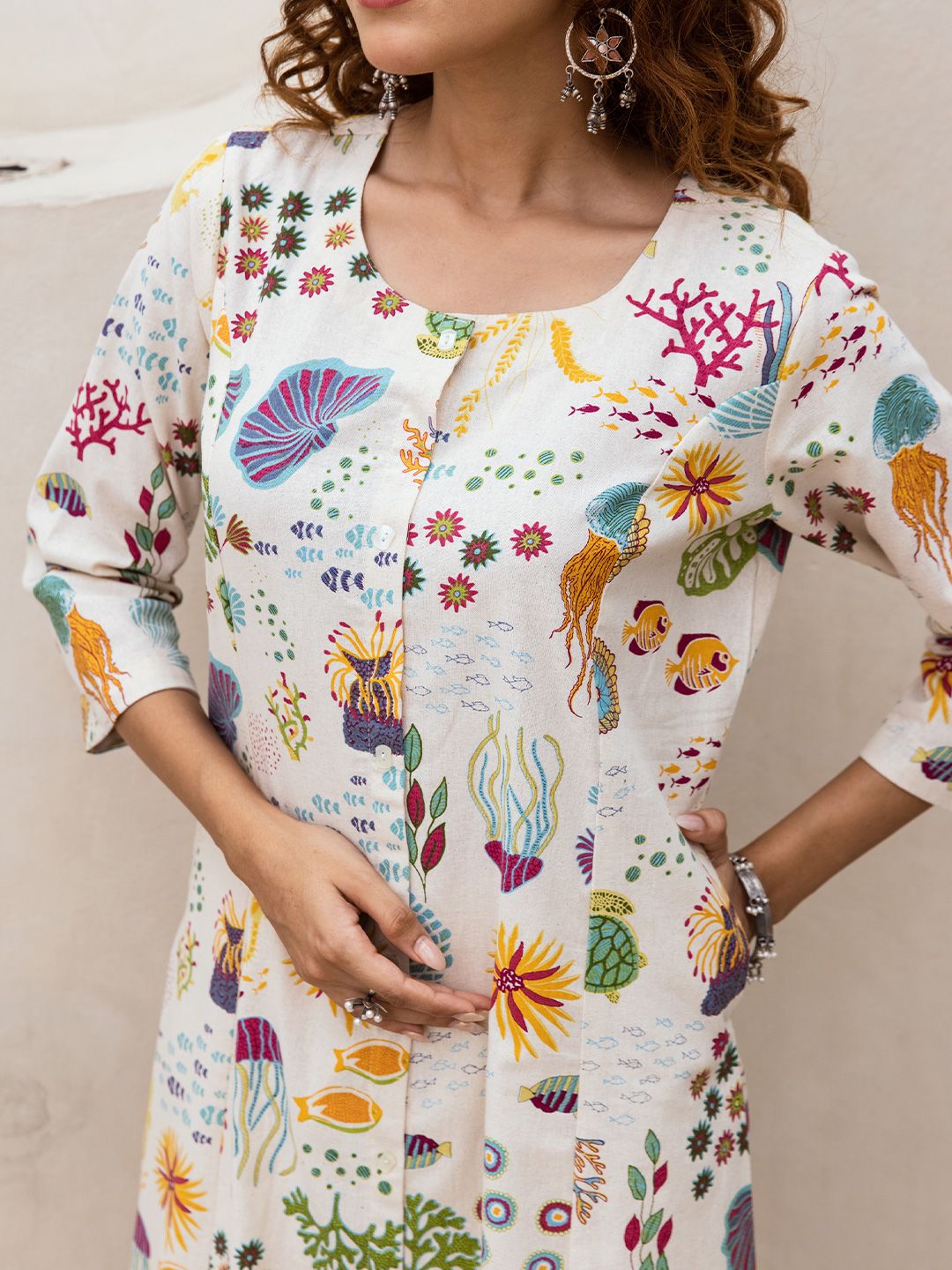 Comfy Off-White Pure Cotton Floral Printed Kurta Set with Gotta Patti Detailing and Straight Bottom