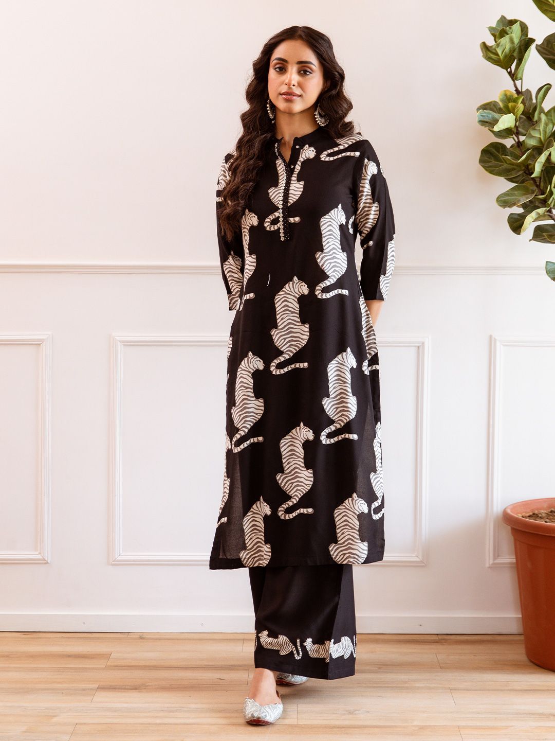 Comfy Black Viscose Rayon Animal Printed Kurta with Mandarin Collar and Palazzos