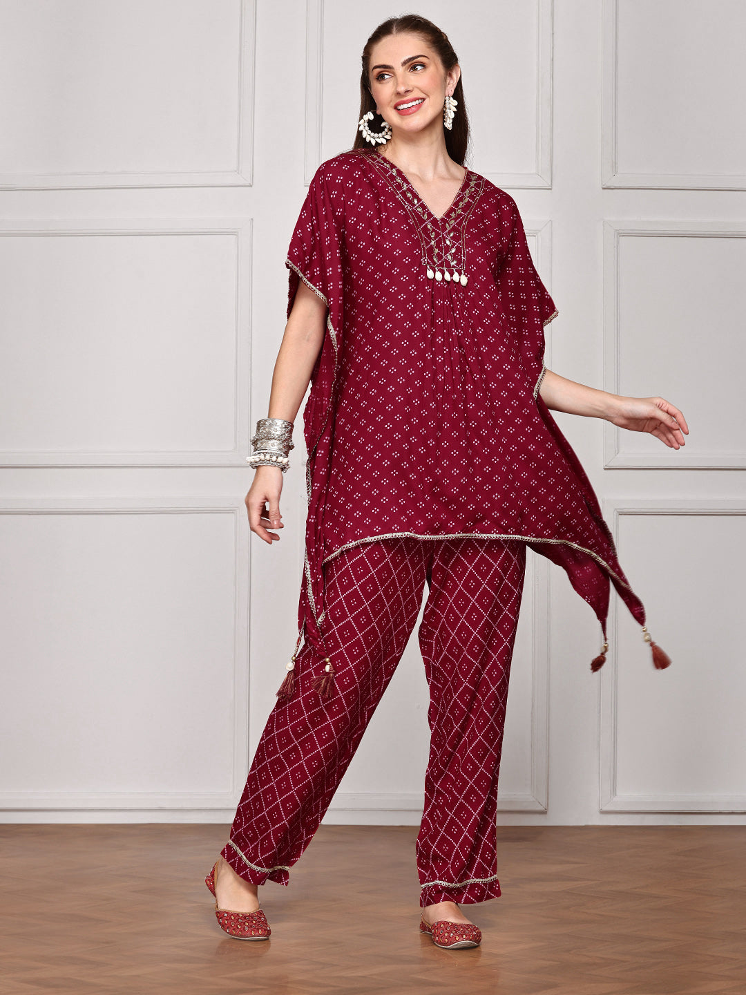 Ishin Women Embellished Bandhani Printed Kaftan Top with Hand Tassels Paired With Trouser