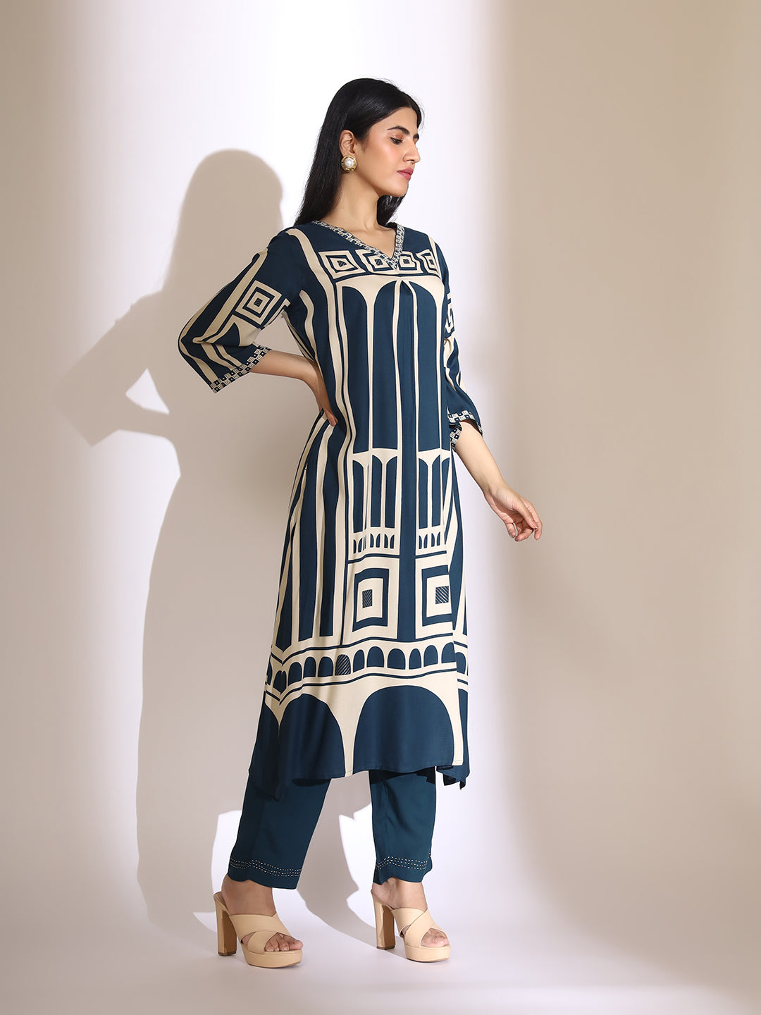 ISHIN Women Geometric Quirky Printed A- Line Kurta and Pants with Embroidered Hem