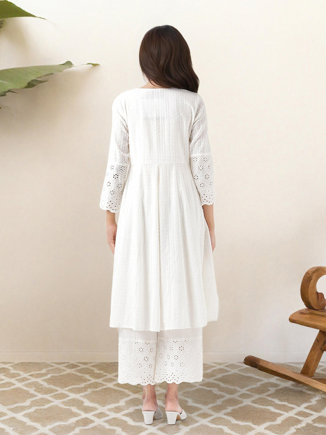 Comfy Off-White Pure Cotton Floral Printed Kurta Set with Gotta Patti Detailing and Straight Bottom