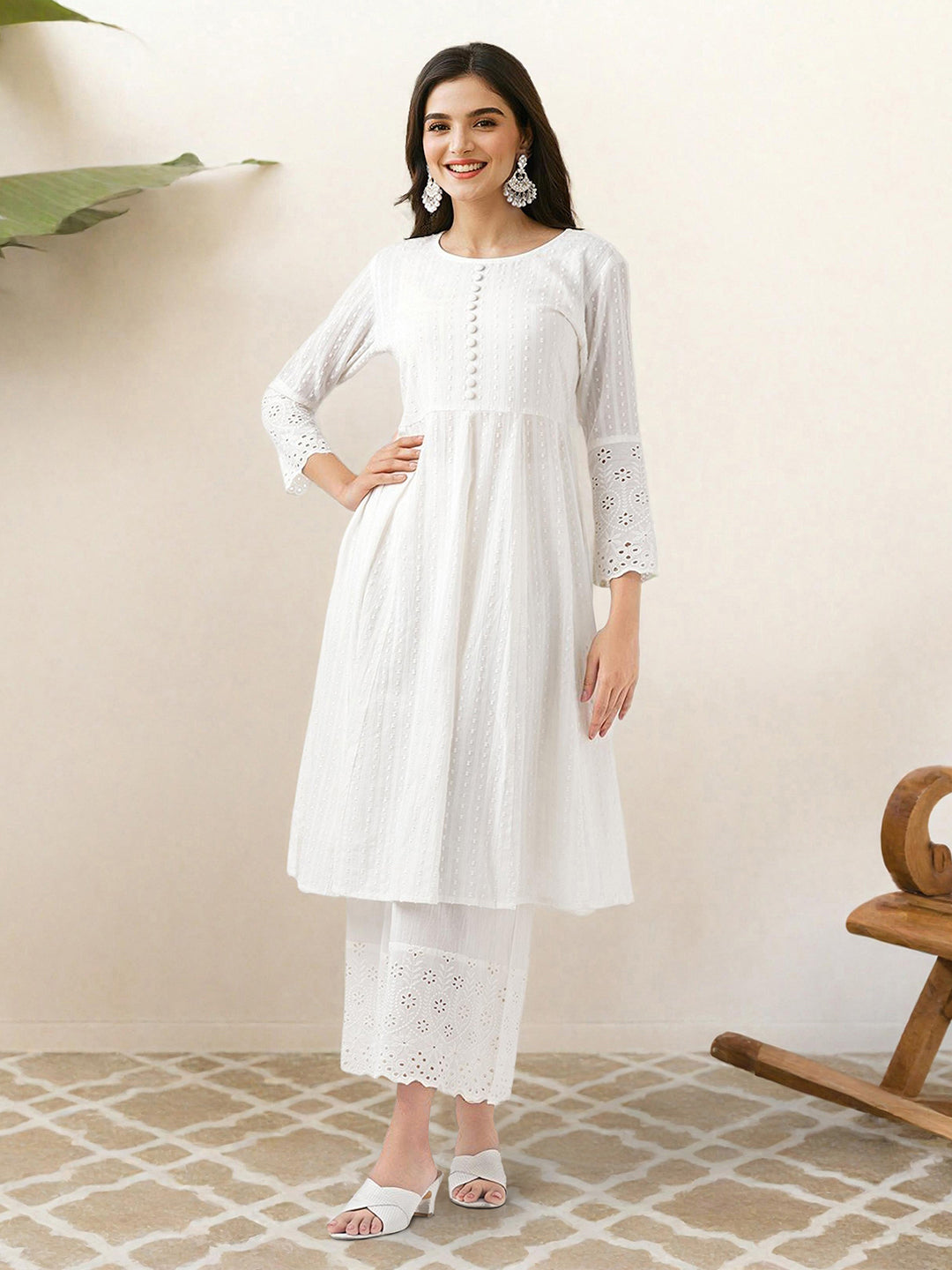 Comfy Off-White Pure Cotton Floral Printed Kurta Set with Gotta Patti Detailing and Straight Bottom