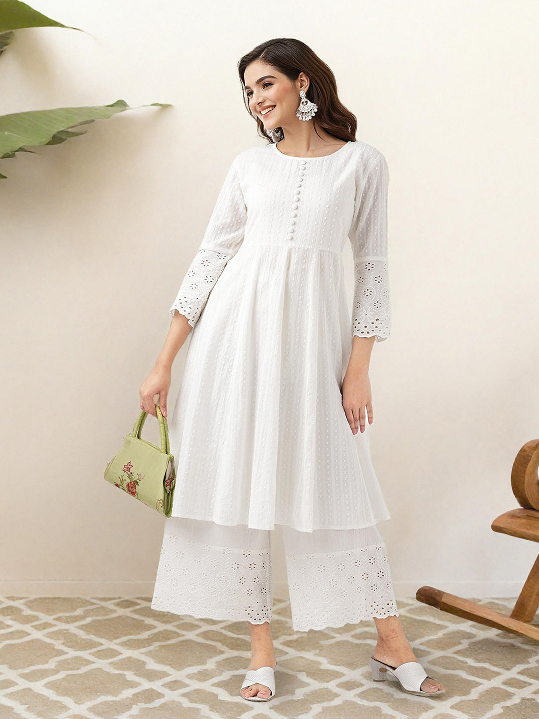 Comfy Off-White Pure Cotton Floral Printed Kurta Set with Gotta Patti Detailing and Straight Bottom