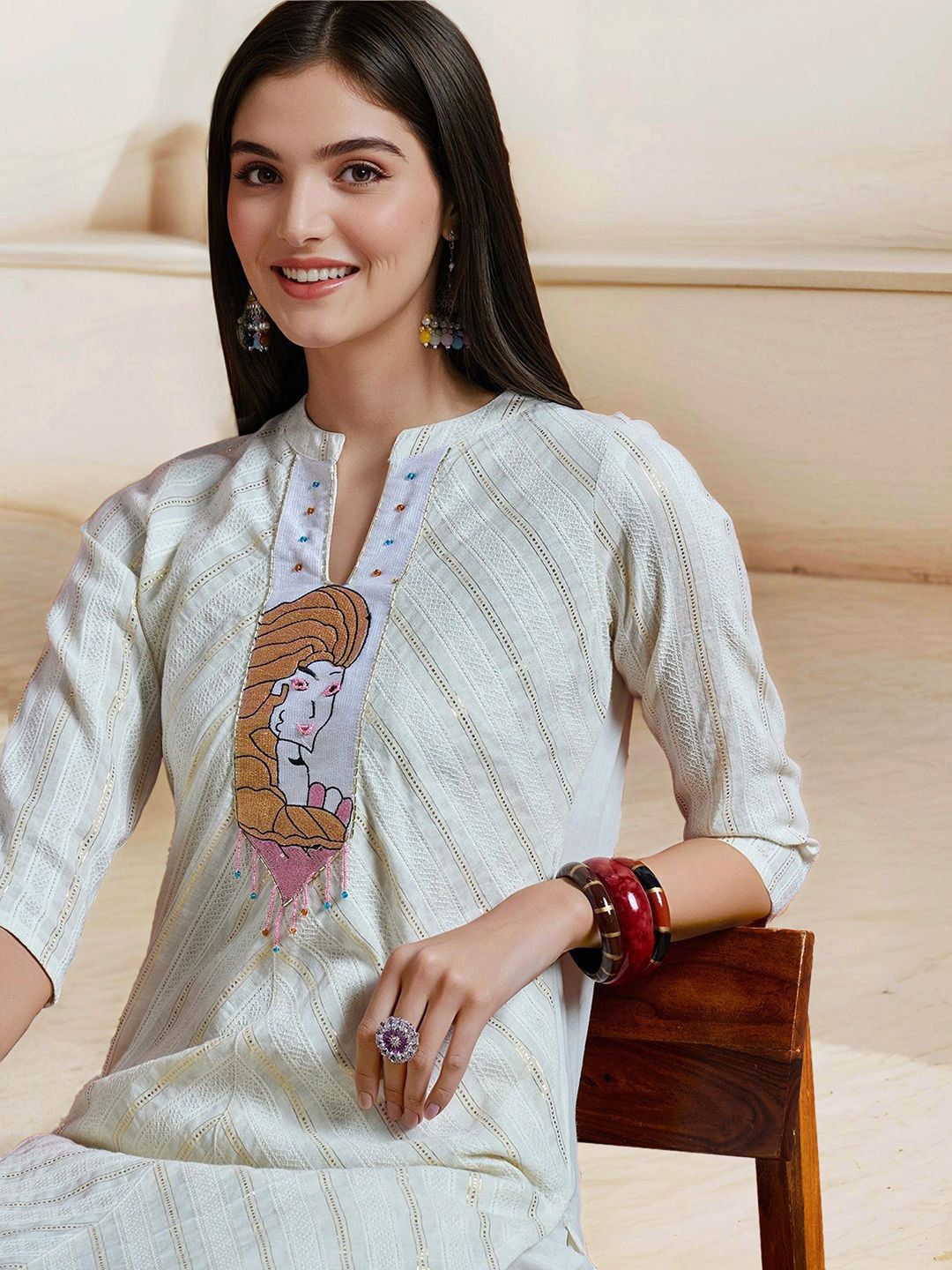 Comfy Off-White Pure Cotton Floral Printed Kurta Set with Gotta Patti Detailing and Straight Bottom