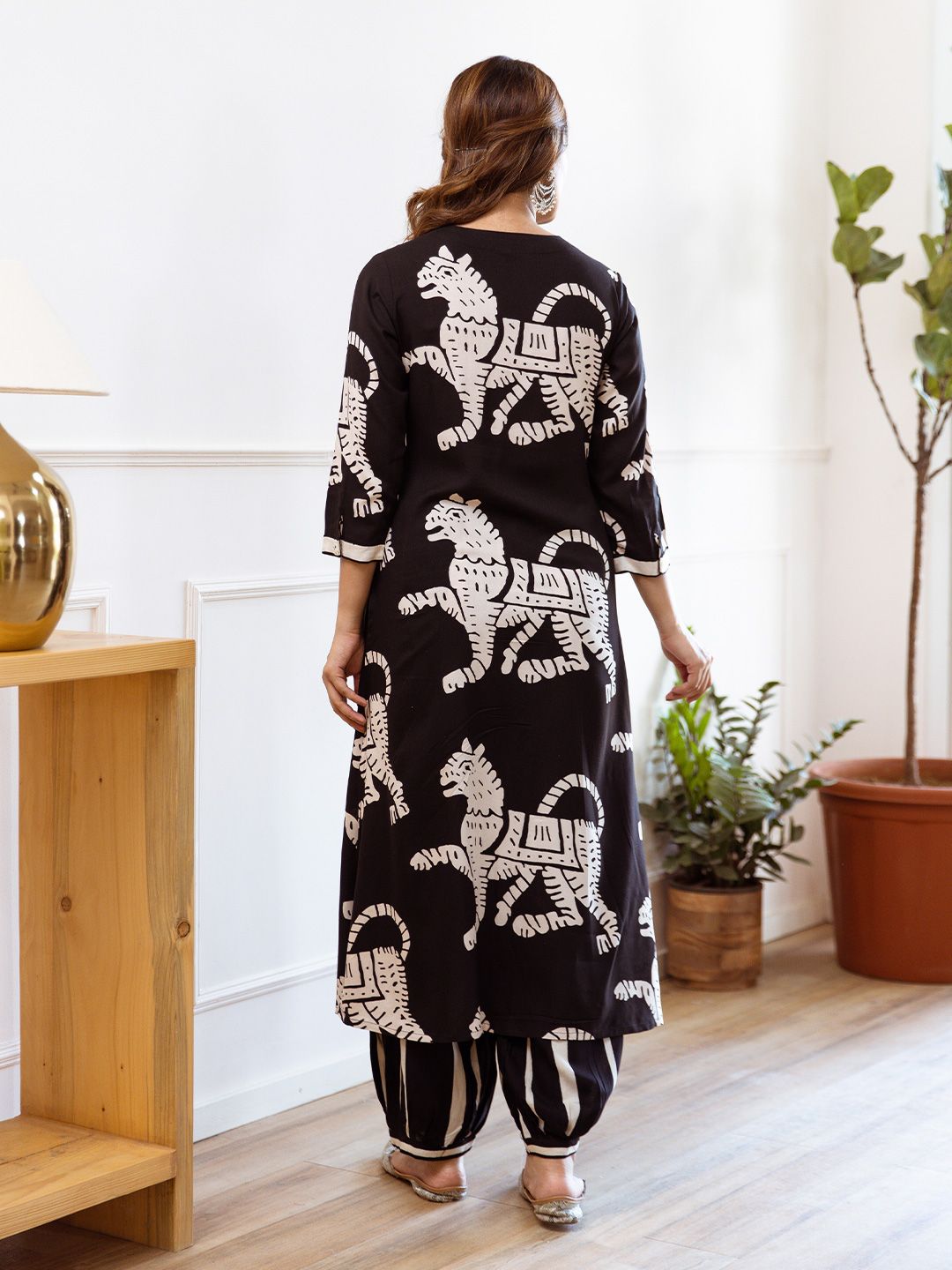 Comfy Black Viscose Rayon Animal Printed Kurta Set with  Afghani Bottom