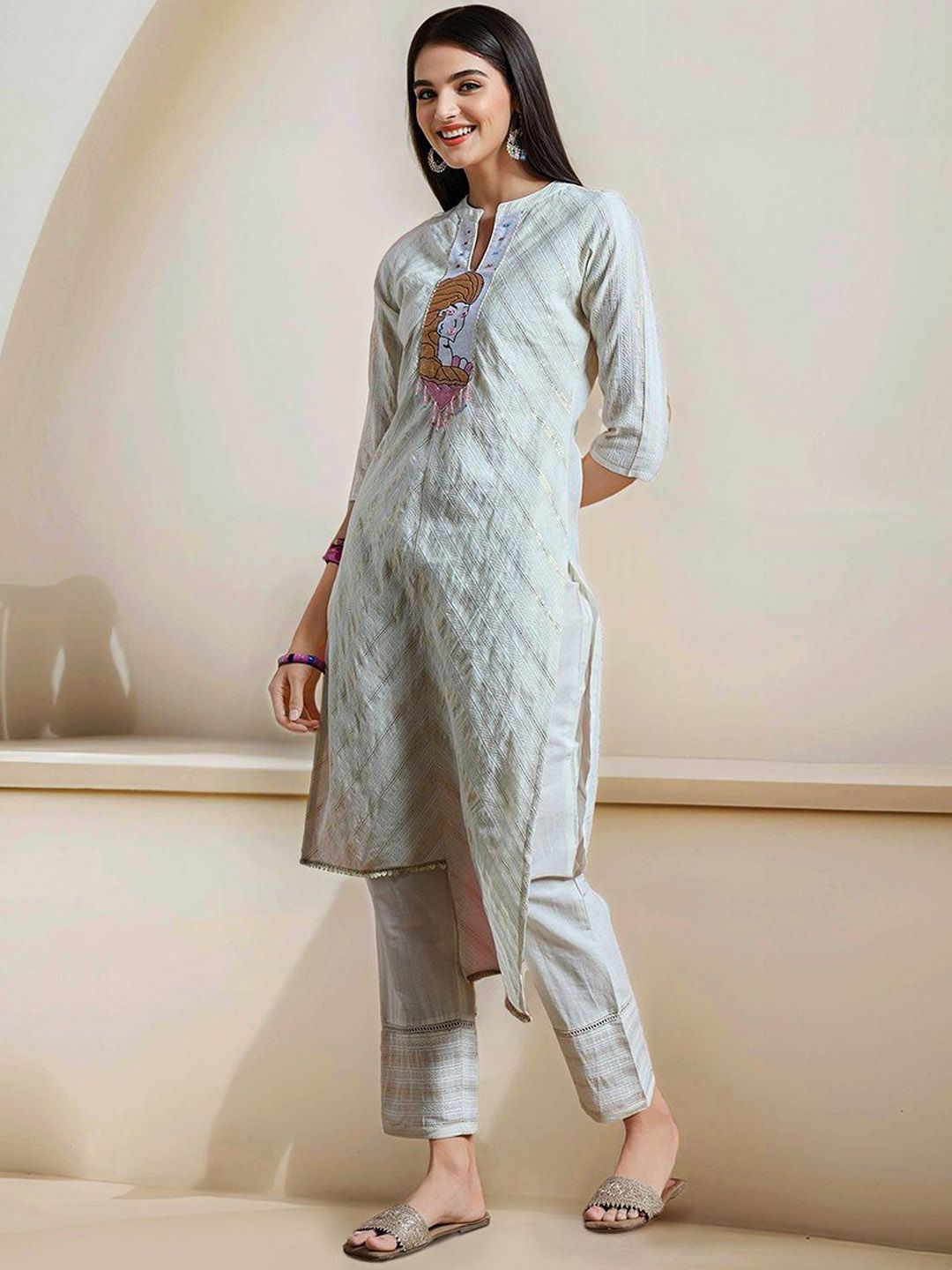 Comfy Off-White Pure Cotton Floral Printed Kurta Set with Gotta Patti Detailing and Straight Bottom