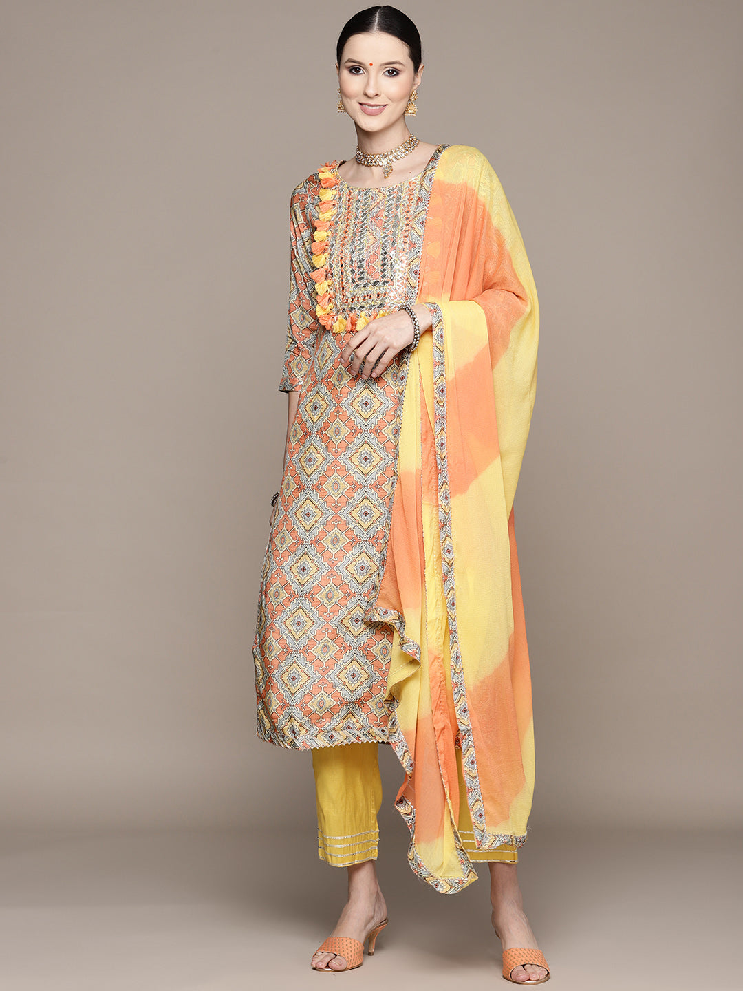 Ishin Women's Mustard Yoke Embroidered A-Line Kurta with Trouser & Dupatta