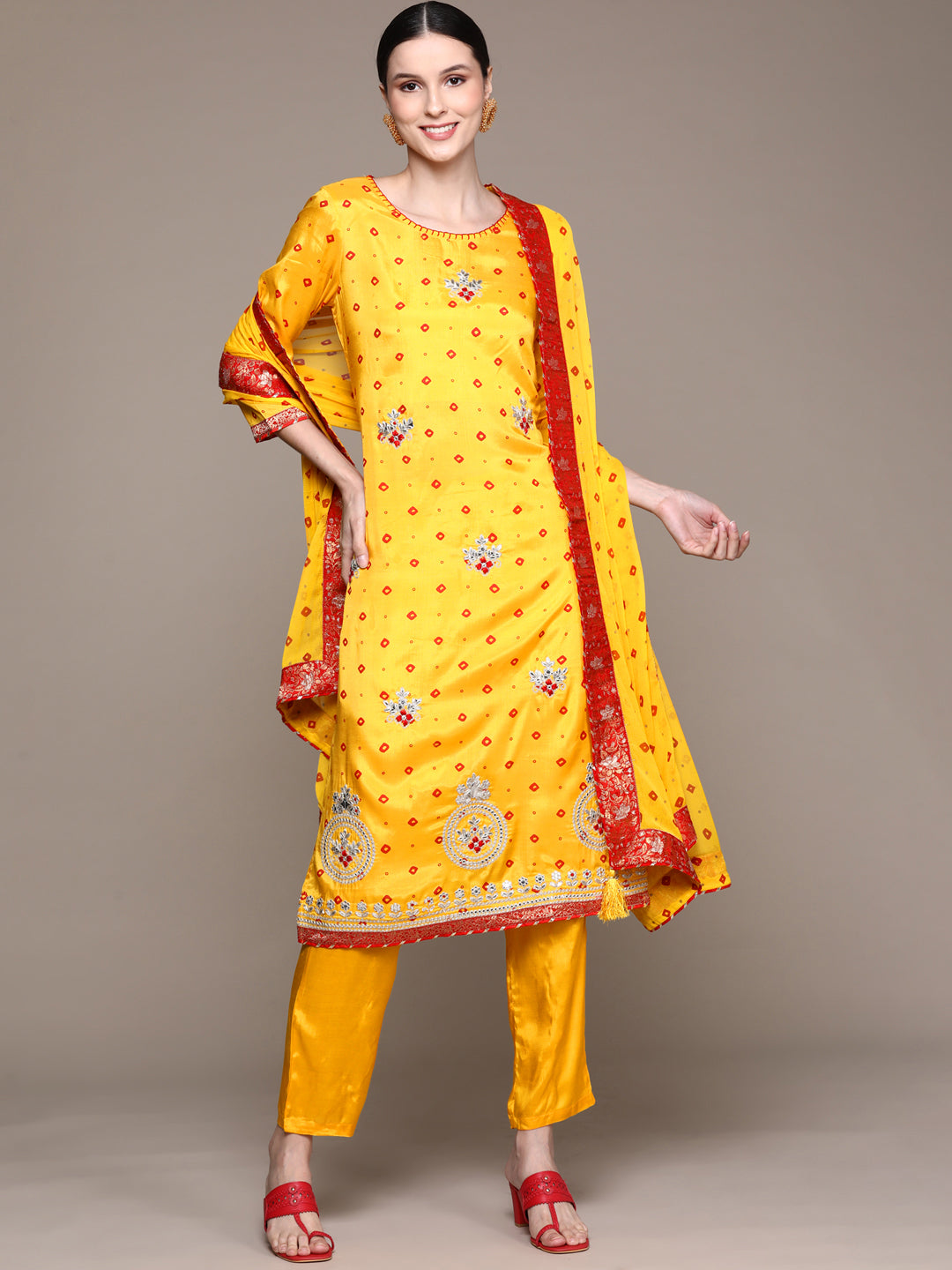 Ishin Women's Yellow Embroidered Bandhani A-Line Kurta with Trouser & Dupatta