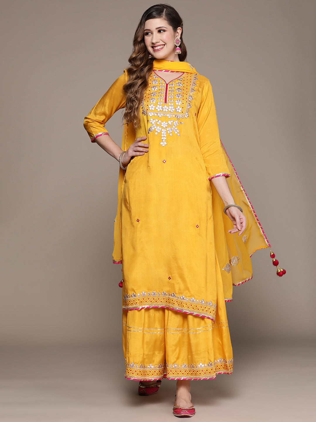 Ishin Women's Yellow Embroidered A-Line Kurta with Sharara & Dupatta