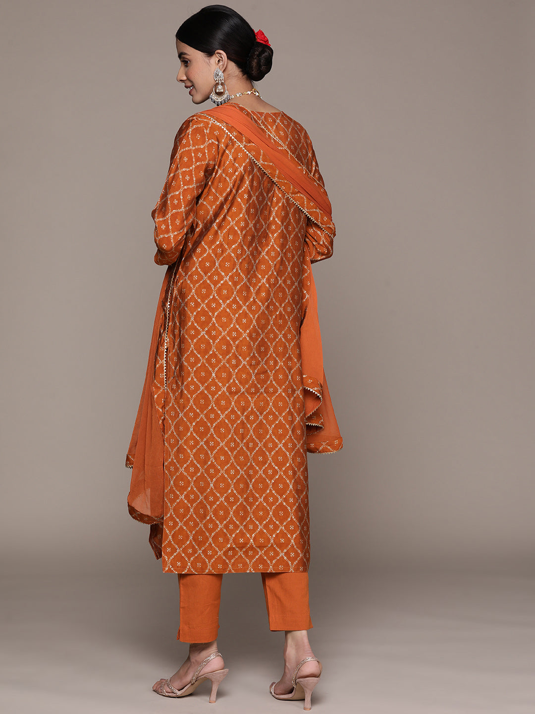 Ishin Women's Orange Embroidered Zari Flared Kurta Set with Pants & with Dupatta