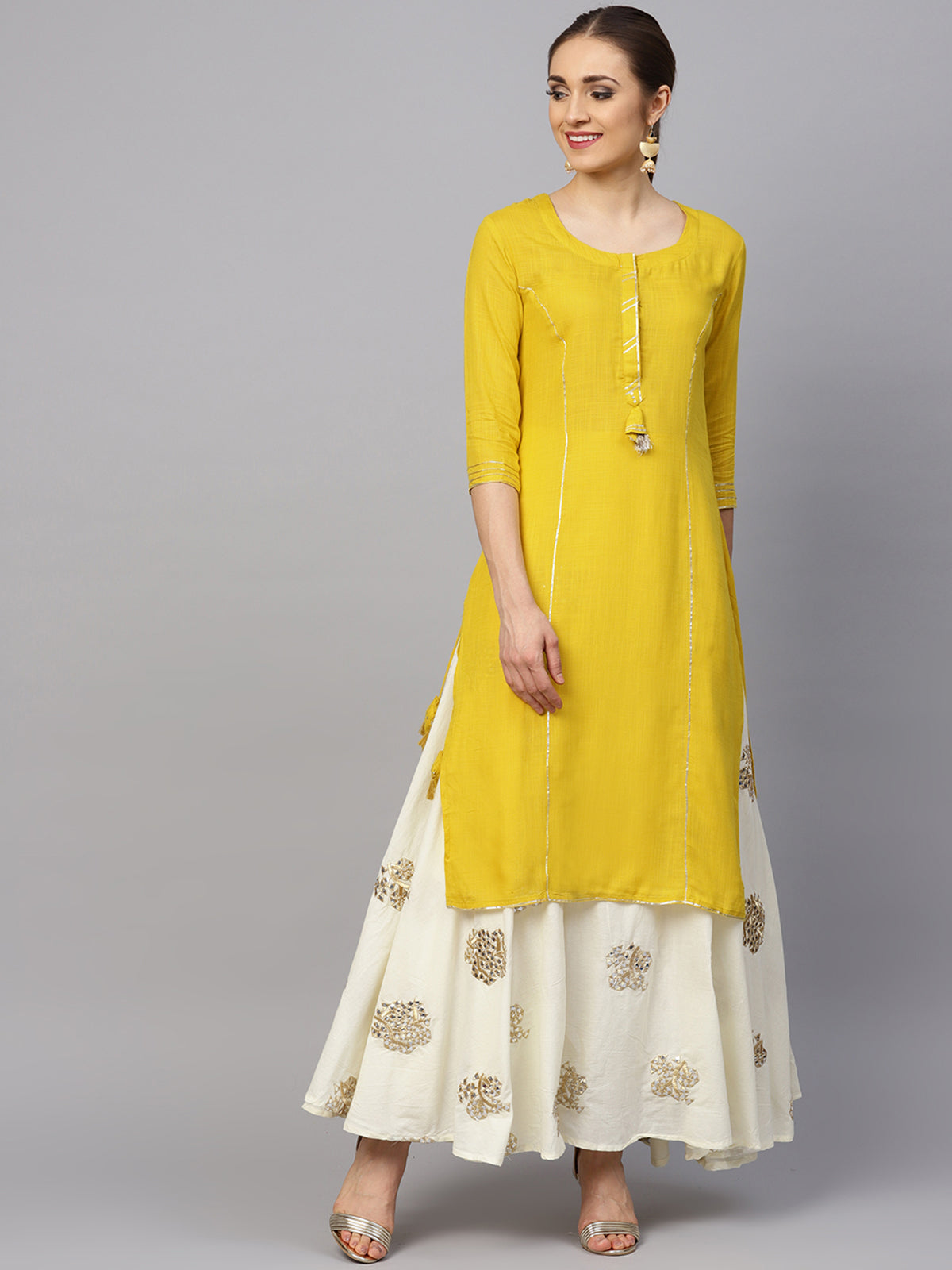 Ishin Women's Rayon Yellow & Off White Solid A-Line Kurta With Embellished Skirt