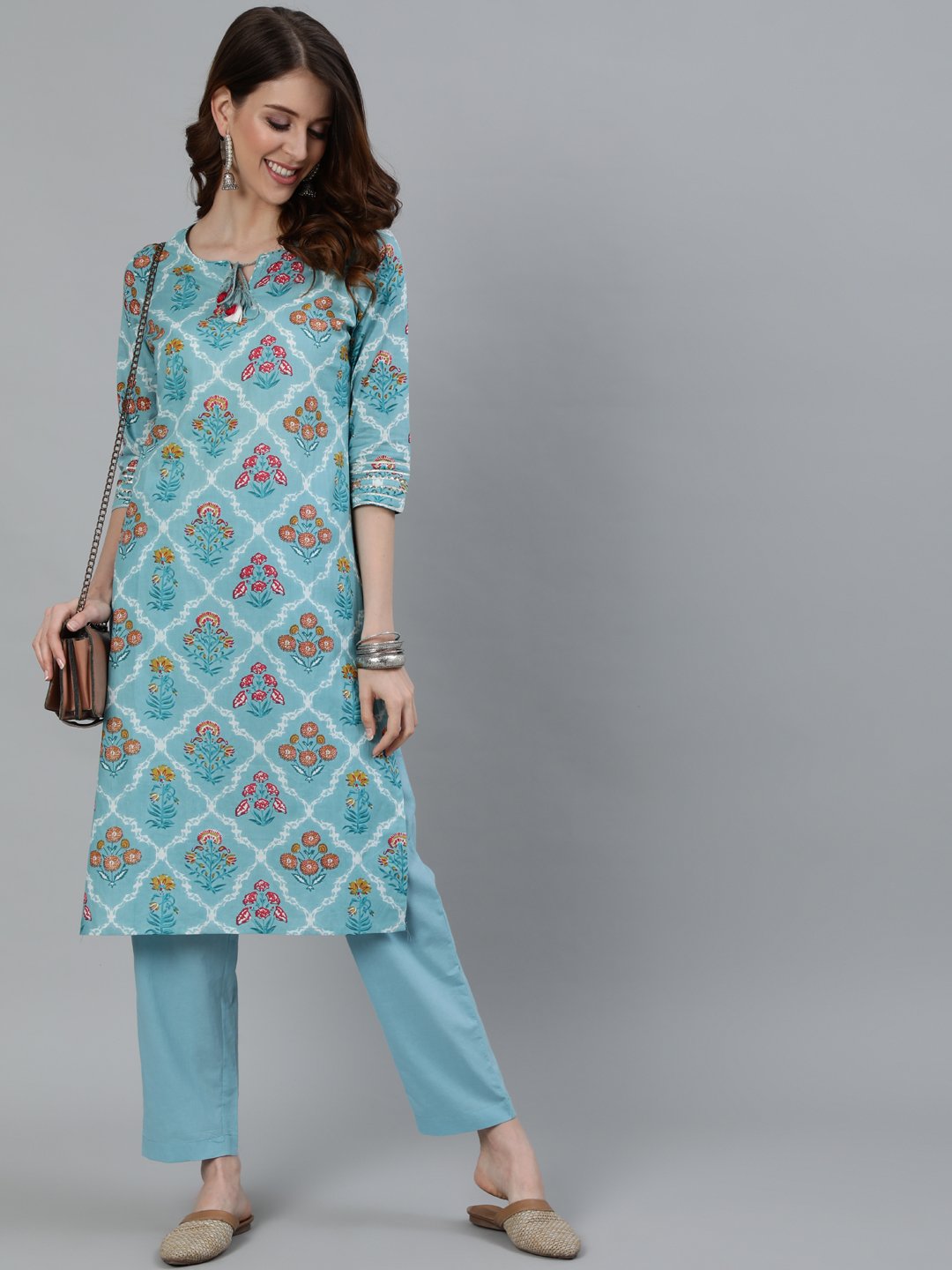 Ishin Women's Blue Floral Printed Straight Kurta With Trouser