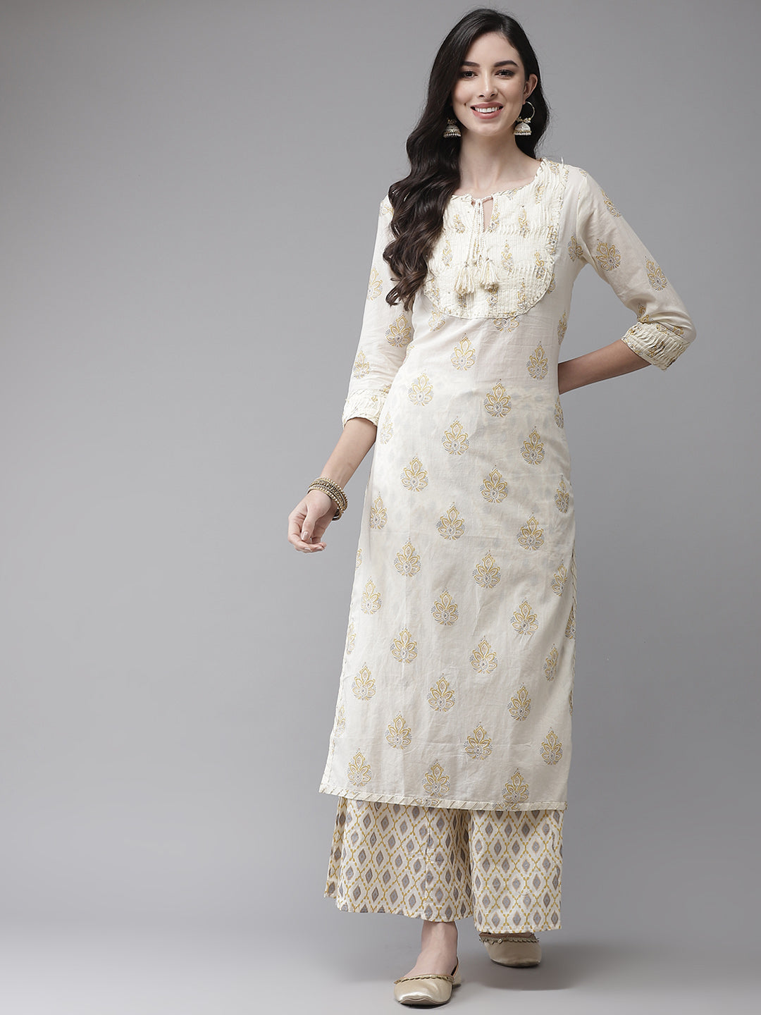 Ishin Women's Cotton Blend Cream Embroidered A-Line Kurta Sharara Set