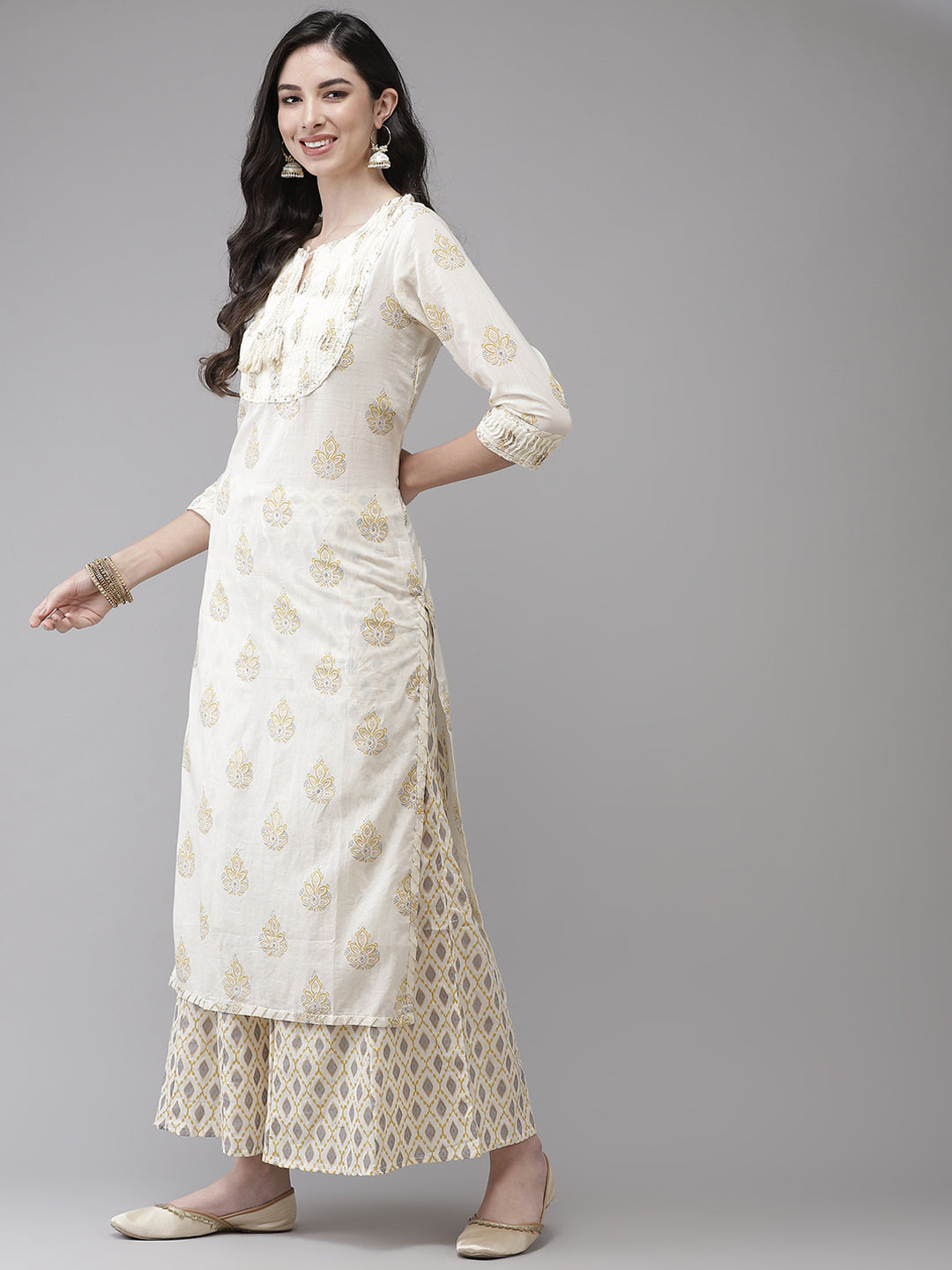 Ishin Women's Cotton Blend Cream Embroidered A-Line Kurta Sharara Set