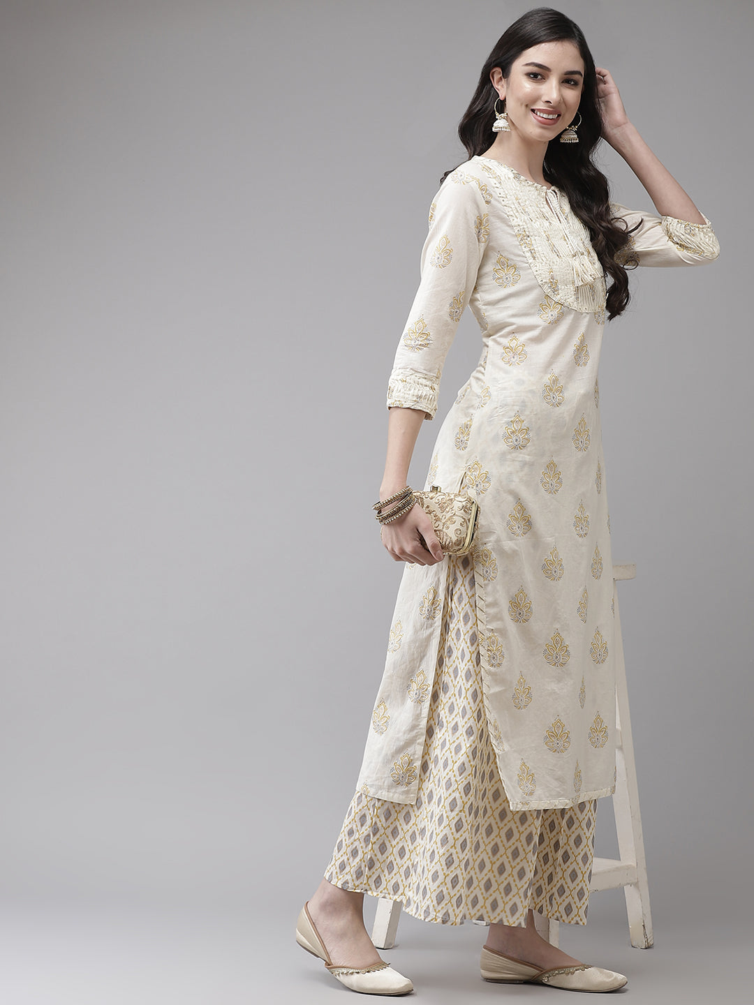 Ishin Women's Cotton Blend Cream Embroidered A-Line Kurta Sharara Set