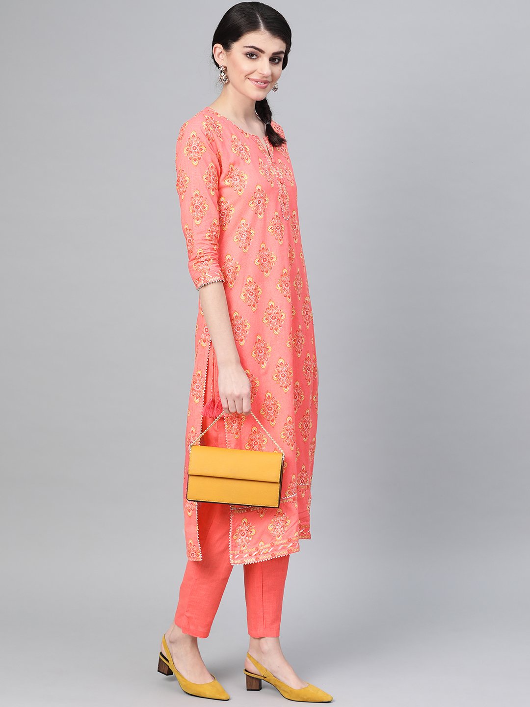 Ishin Women's Cotton Peach Embroidered A-Line Kurta Trouser Set